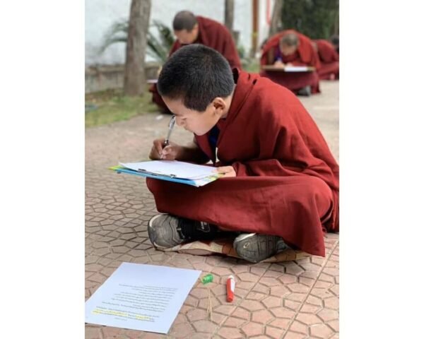Young Buddhist Monks giving exam